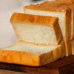 Fresh bread on a wooden table